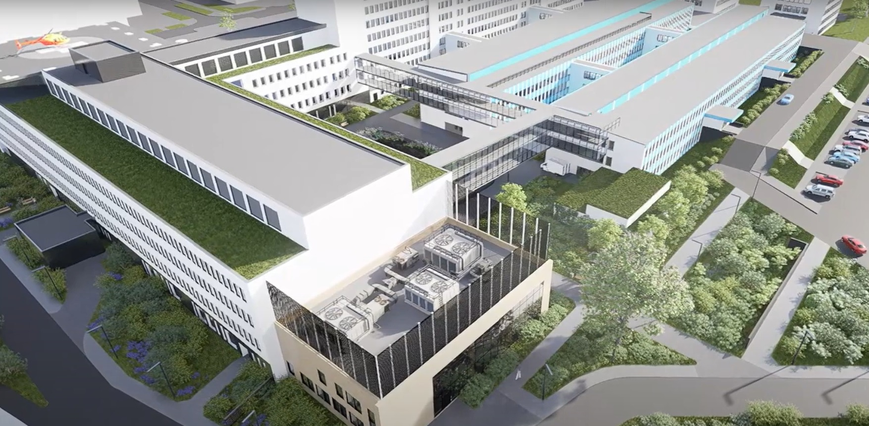 Wizualizacja nowego budynku szpitala z lotu ptaka uwzględniająca istniejące budynki A, B i C